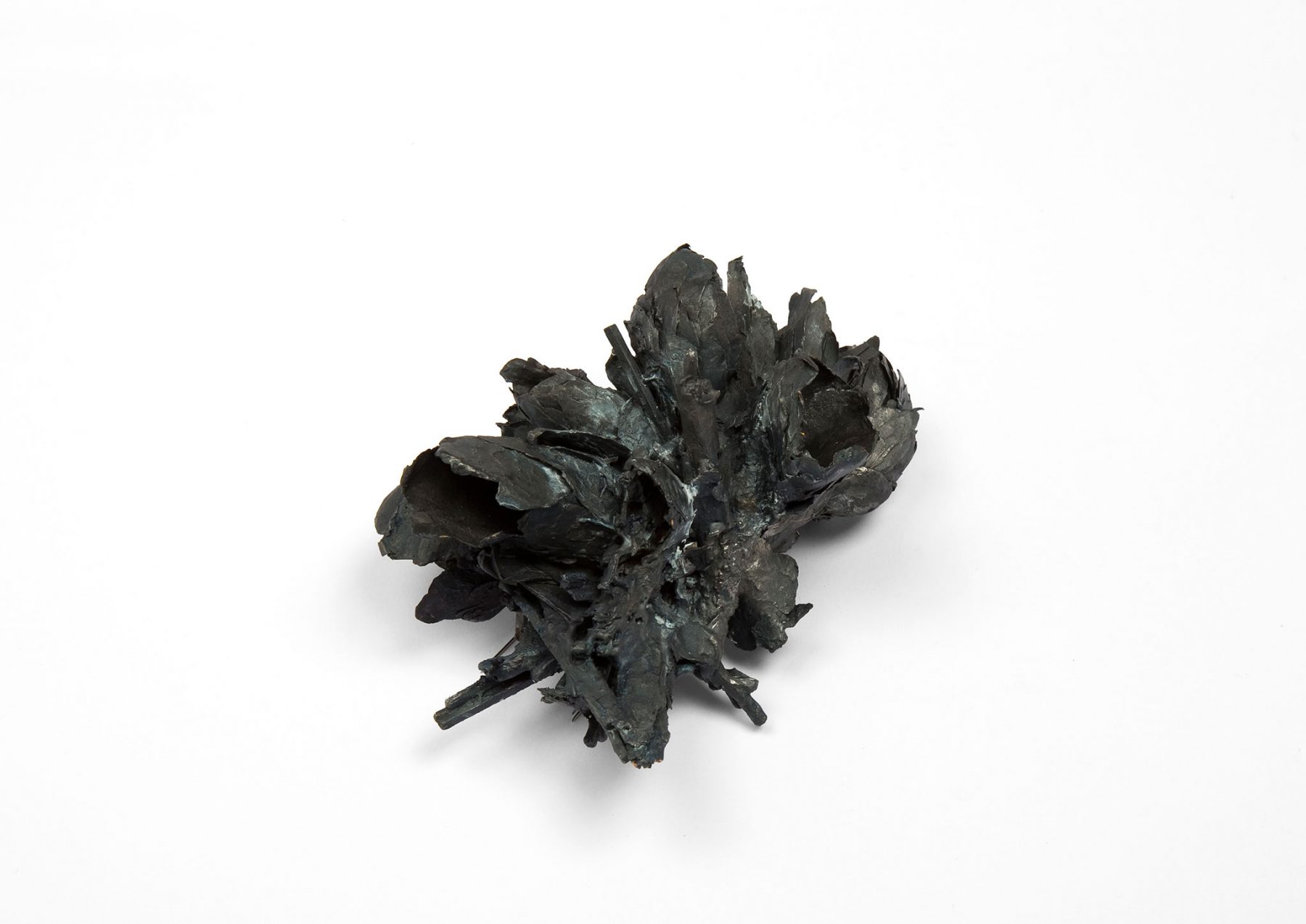 Untitled |    Brooch    |  2014    | Treated cellulose, Cardboard, paint, glue, wood, silver, stainless steel   |   120X160X70 mm