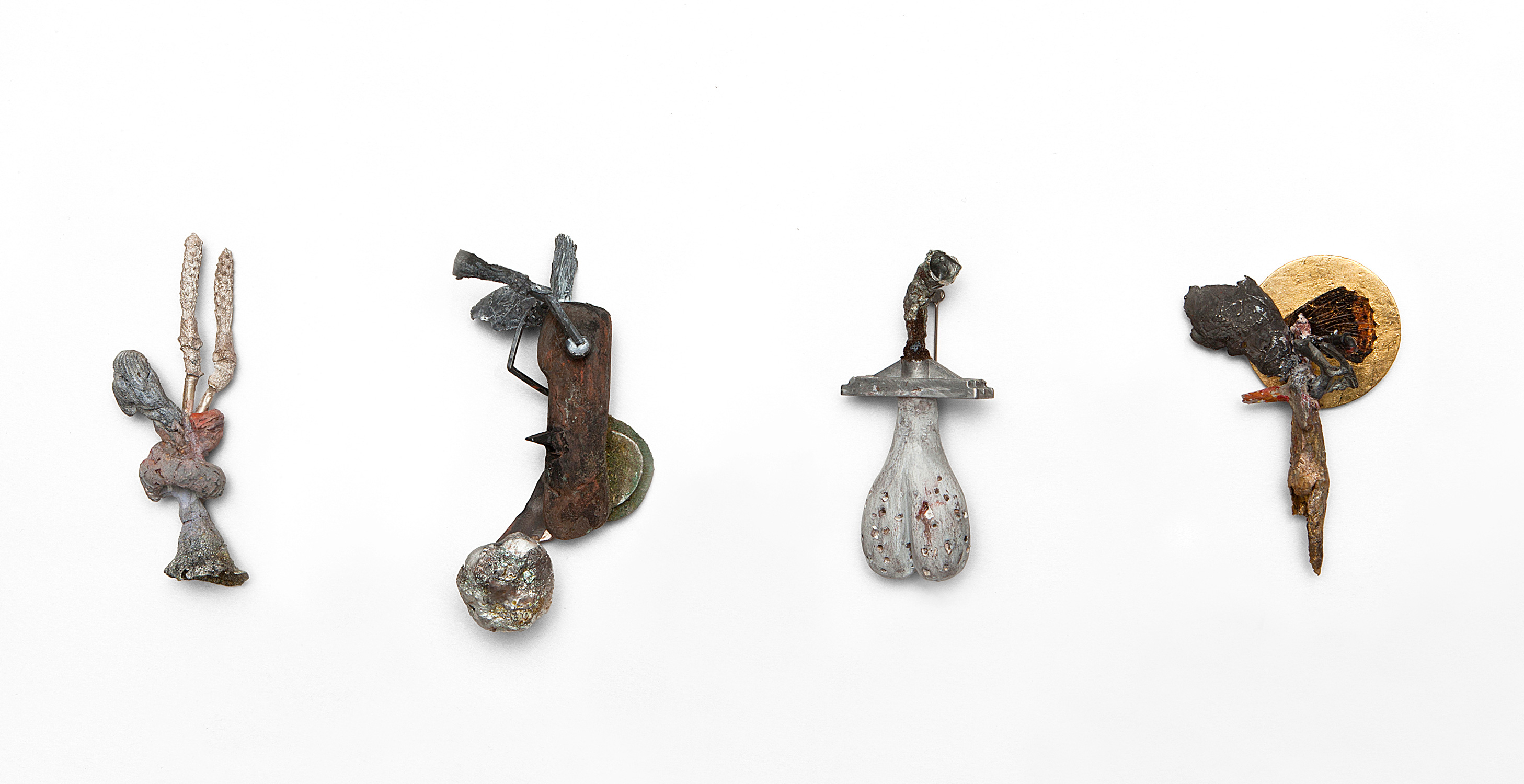 From Left: Untitled, "Édouard Brown-Séquard" |  Brooch, Pendant  | 2013-14 | Wood, color, silver, stainless steel, brass, enamel, aluminium, enamel, gold leaf, butterfly, plastic  | 100X30X20 mm - 80X35X25 mm
