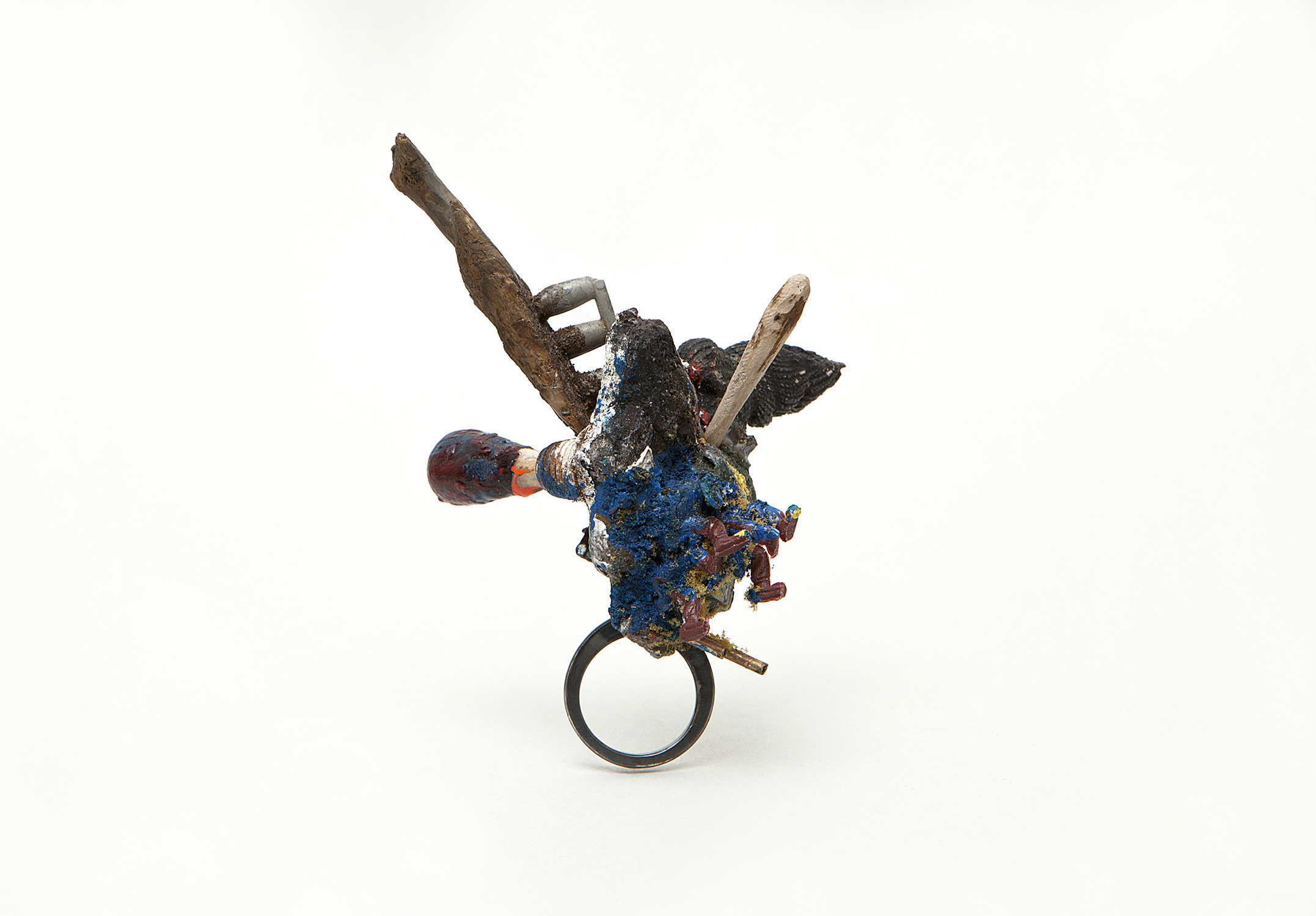“Reduction”    |  Ring  |    2014    |  Wood, Paint, silver, plastic, paper   |   100X70X70 mm